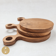 Load image into Gallery viewer, Joyhouseofseratku_Bliss Teak Wood as wooden bread board, wooden cheese board, wooden pastry board, round charcuterie board
