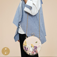 Load image into Gallery viewer, Joyhouseofseratku_The Marigold bag is a must-have accessory for every fashionista! Designed with a round shape, long chain strap, and gorgeous hand-embroidered details, this cross-body bag is sure to make a lasting impression. Whether it&#39;s for a nude evening bag or a multi coloured clutch bag, this handbag is sure to elevate any look.
